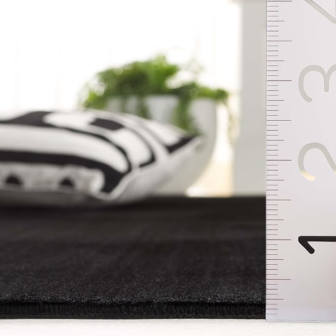 SAFAVIEH Washable Rug Faux Rabbit Fur Shag Collection - 8' x 10', Black, Slip Resistant & Easy Cleaning, Ideal for Living Room, Bedroom, Dining Space (FRF100Z)