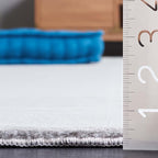 SAFAVIEH Washable Rug Faux Rabbit Fur Shag Collection - 2' x 3', Silver, Slip Resistant & Easy Cleaning, Ideal for Accent Space, Foyer, Bedside, Bathroom, Nursery, Boys & Girls Room (FRF100G)