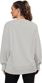 Nirovien Womens Oversized Crewneck Sweatshirt Side Slit Long Sleeve Pullover Slouchy Fit Tops