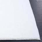SAFAVIEH Washable Rug Faux Rabbit Fur Shag Collection - 2' x 3', Ivory, Slip Resistant & Easy Cleaning, Ideal for Accent Space, Foyer, Bedside, Bathroom, Nursery, Boys & Girls Room (FRF100A)