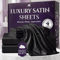 SLEEP SANCTUARY Satin Sheets King Size – 4 Piece Luxury Silky Bed Set, Softer Than Silk, 15" Deep Pocket, Cooling & Wrinkle-Free, Moisture-Wicking & Breathable for Hair & Skin (Black)