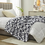 Amélie Home Chunky Knit Throw Blanket for Couch, Soft Chenille Handmade Crochet Throw Rope Knot Blanket for Couch, 50"x60", Space-Dyed Black