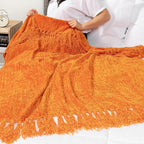 Pavilia Orange Knit Woven Blanket with Tassel, Decorative Textured Blanket for Living Room, Twin Size 60x80