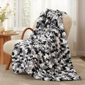 Amélie Home Chunky Knit Throw Blanket for Couch, Soft Chenille Handmade Crochet Throw Rope Knot Blanket for Couch, 50"x60", Space-Dyed Black