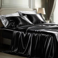 Bedsure Black Satin Sheets Queen Size - 4 Piece Silky Bedsheets with Elastic Corner Straps and 15 Inches Deep Pocket Fitted Bedsheet,1 Flat Sheet, 2 Satin Pillowcases, Good for Hair& Skin(Queen,Black)